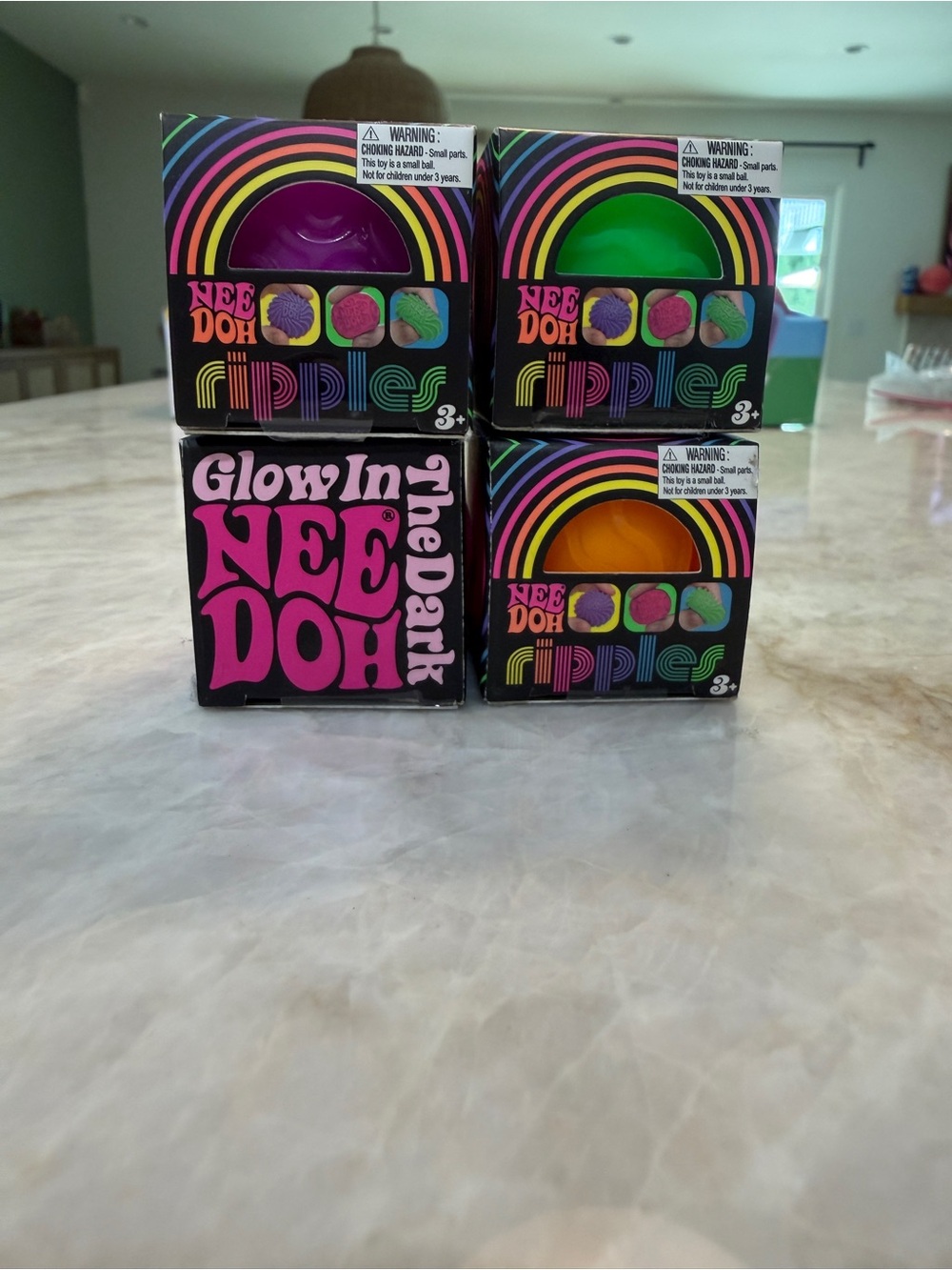 Set NeeDoh Mini- 3 Ripple & 1 Glow in the Dark. Purple, Green, Orange, Pink.
